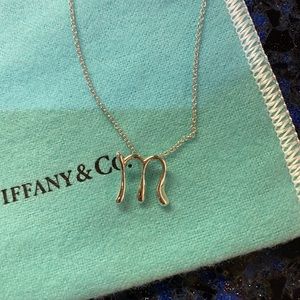 Tiffany & Co. “M” necklace